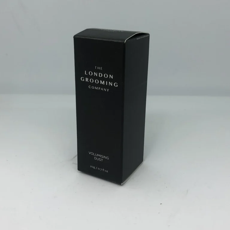 Black folding carton for a men’s grooming product